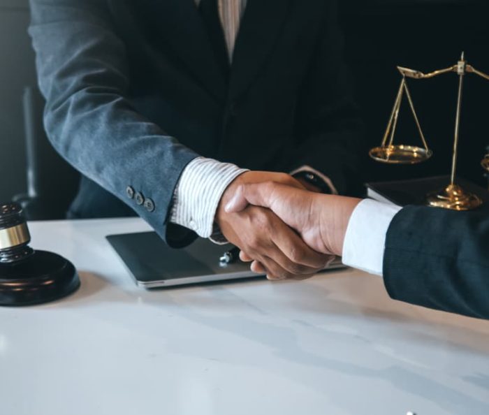 Client Shaking Hands With Lawyer — Law Firm in Coffs Harbour, NSW