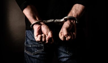Man In Handcuffs — Law Firm in Coffs Harbour, NSW